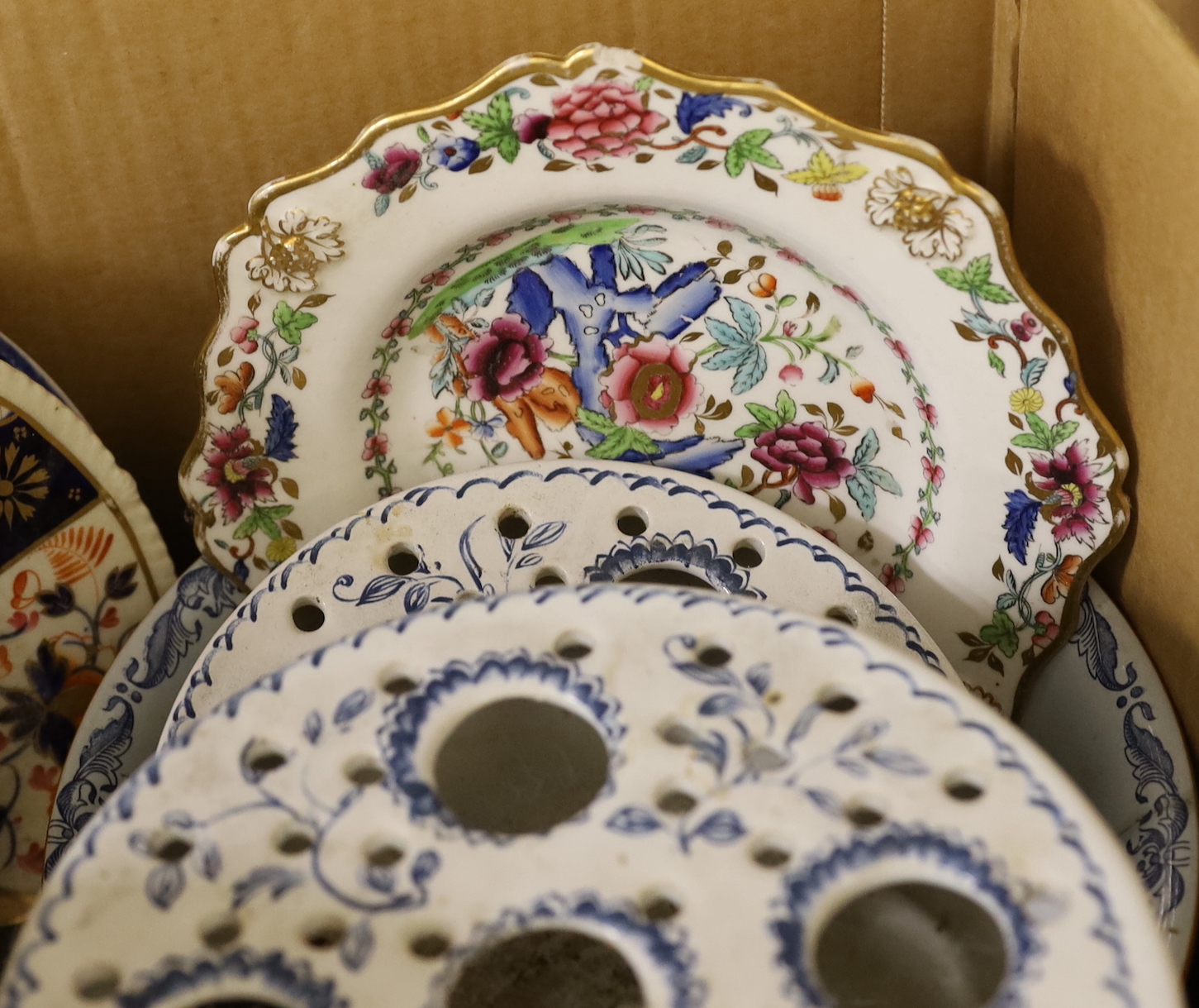 A collection of mixed ceramics including ironstone and Rörstrand Ostindia together with two decanters with plated mounts and labels, some museum reproductions